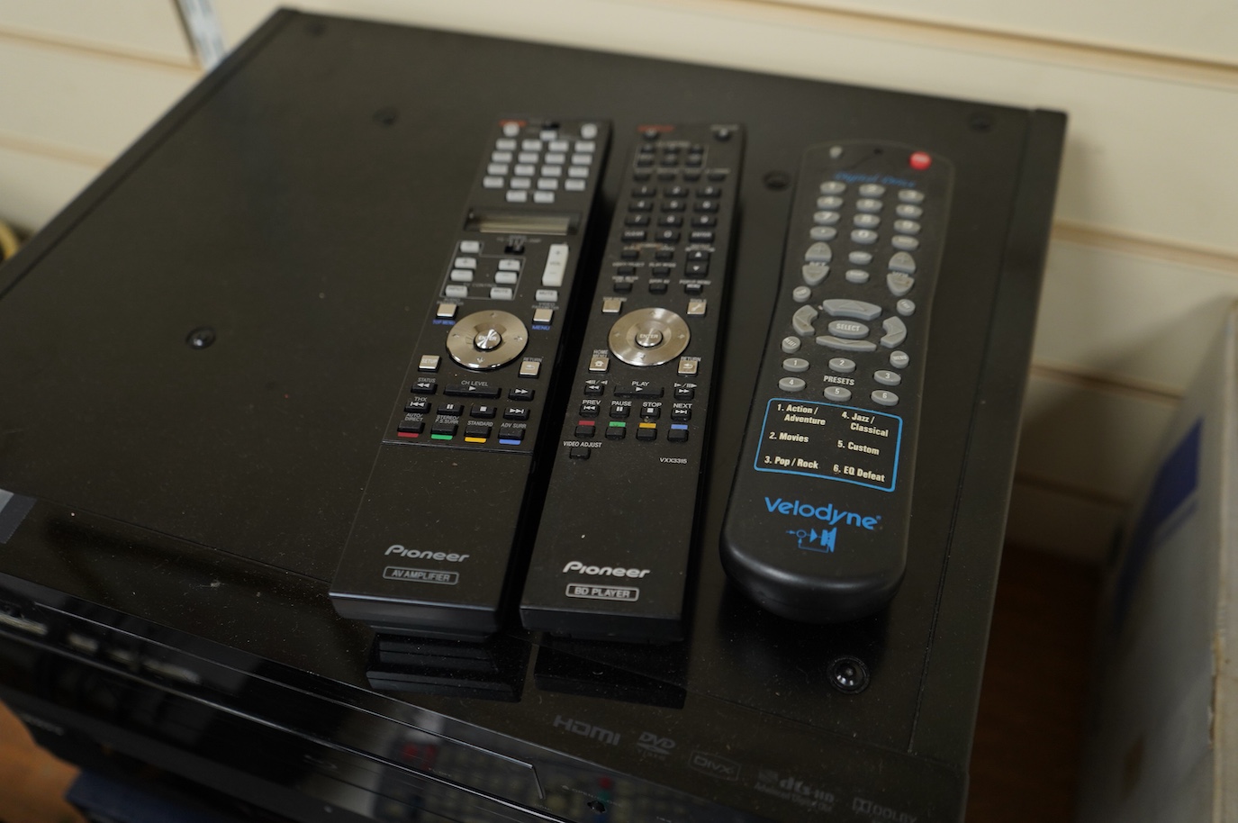 Three Blu-ray/DVD players including; an OPPO BDP-105EU Blu-ray player with user manual and remote control, a Pioneer BDP-LX91 Blu-ray player with remote control, and a Tascam DV-RA1000HD DVD player with owners manual, bu